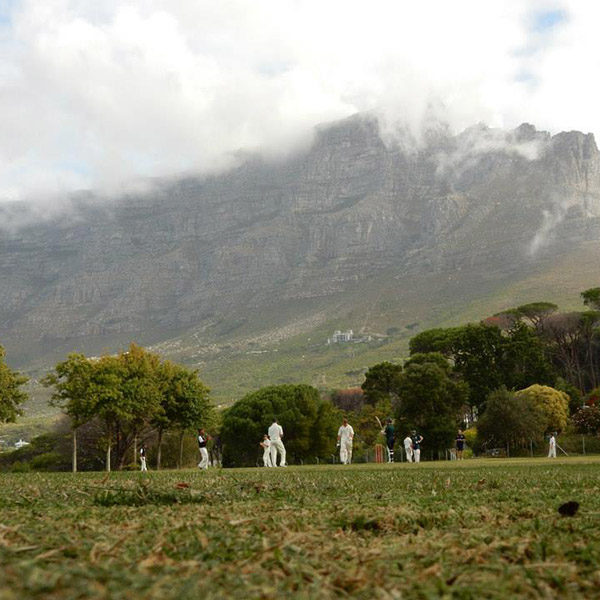 cricket match by the mountain