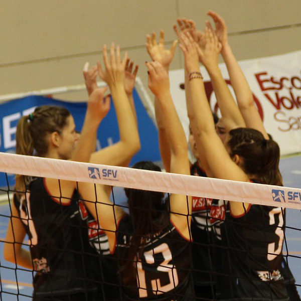 volleyball team celebrates