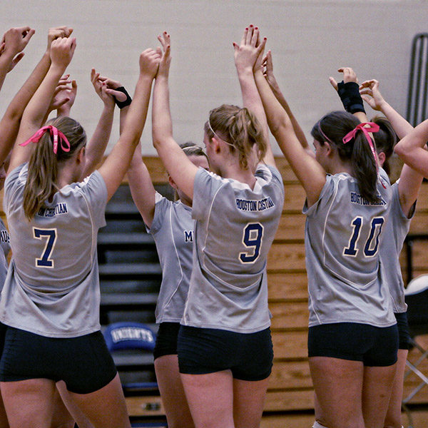 volleyball team celebrating